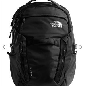 The northface SURGE woman’s backpack NWOT